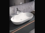 Lavabo PYRGOS 57 cm blanc brillant. Installation murale ou à poser, vasque ovale design avec trou robinetterie. Garantie 10 ans. Livraison gratuite.