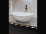 Vasque NYMFES ovale 40 cm en céramique blanc brillant. Design moderne à poser, sans trop-plein. Entretien facile UP-CLEAN. Garantie 10 ans. Livraison gratuite.
